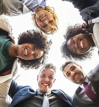 Patients smiling after their invisalign treatment